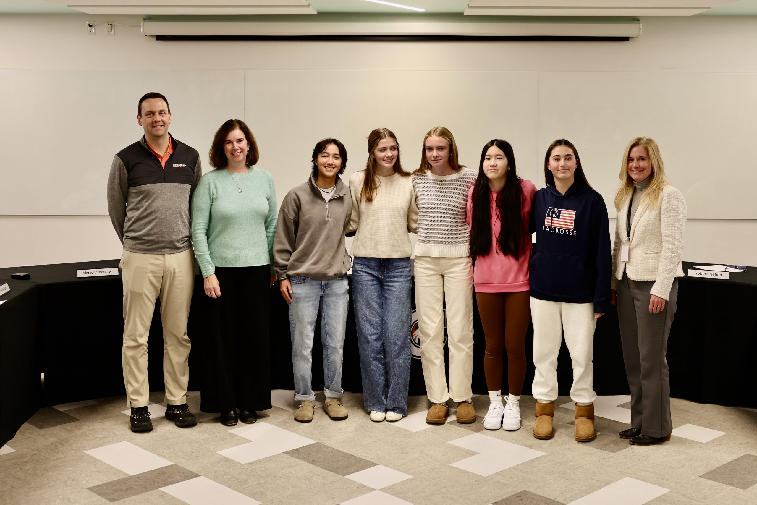 Photograph of Superintedent Jody Monroe,Board of Education President Holly Dellenbaugh and the Bethlehem girls golf team