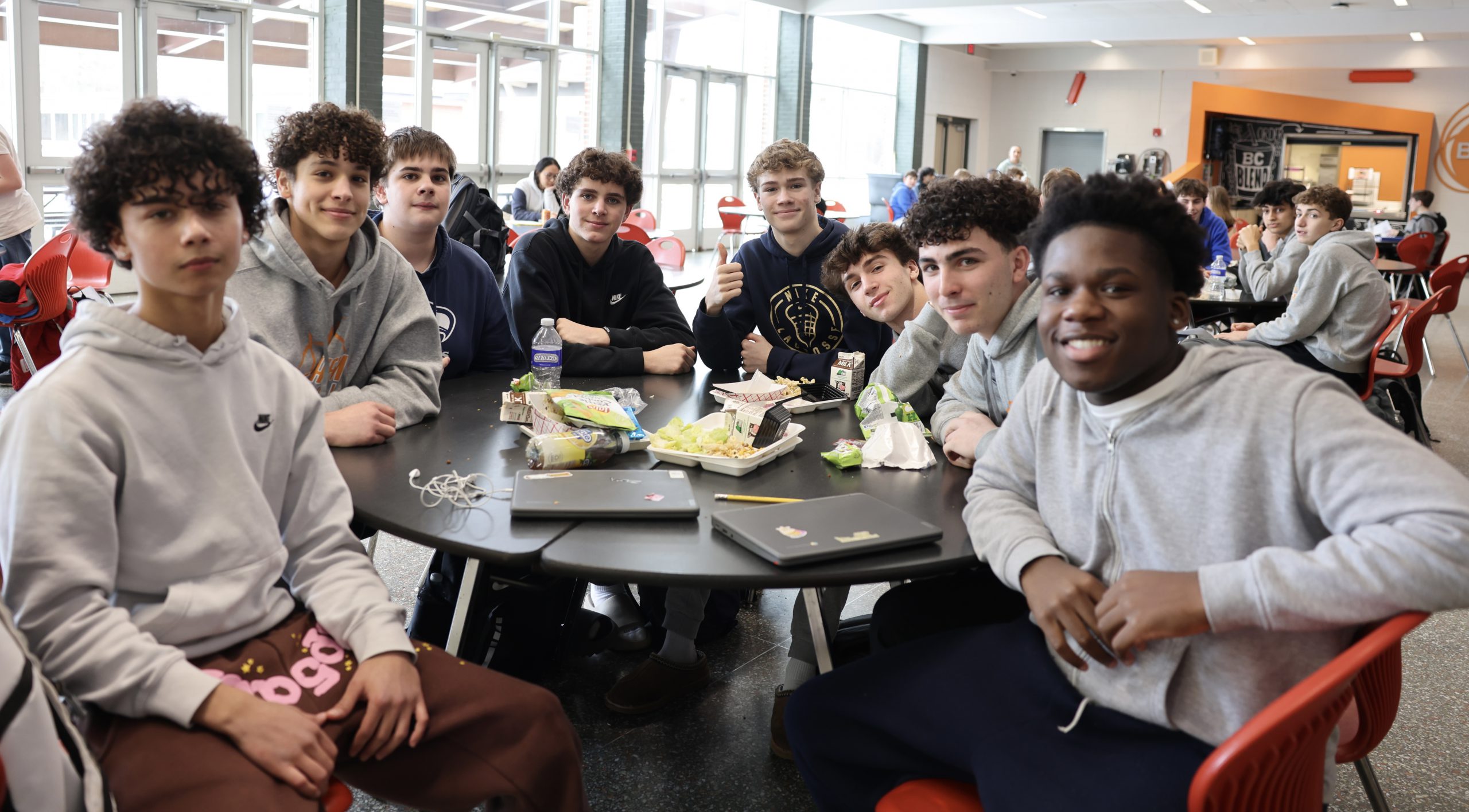 group of students at cafeteria table