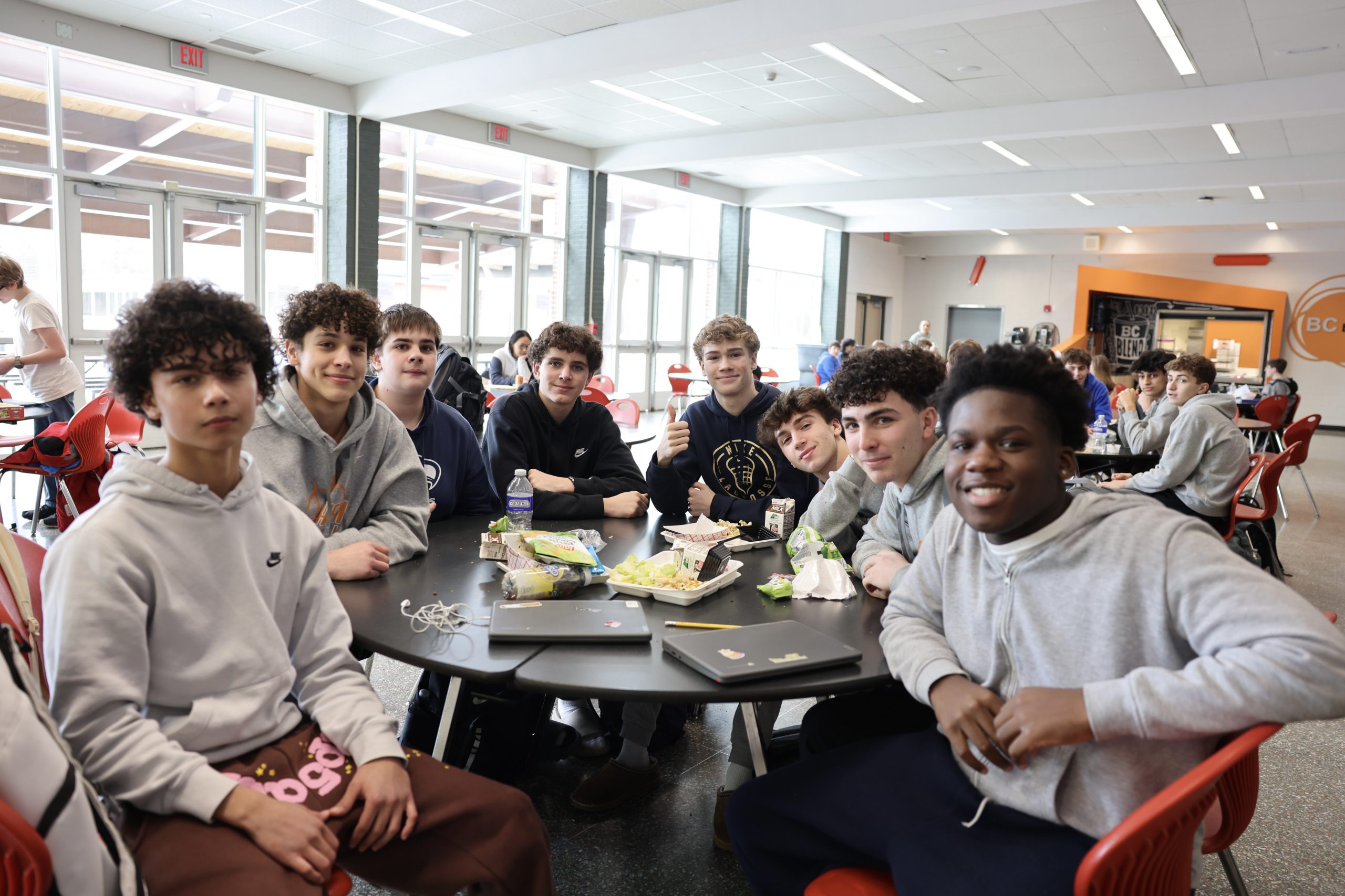 group of students at cafeteria table